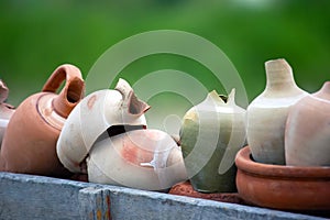 stacked together broken clay pots