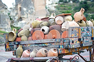 stacked together broken clay pots