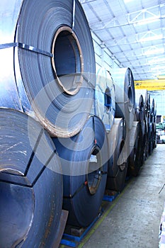 Stacked Up Hot Rolled and Cold Rolled Steel Coils photo
