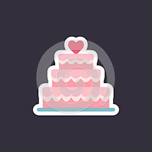 Stacked wedding cake dessert with heart.