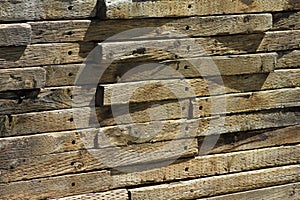 Stacked wood railroad tie retaining wall background