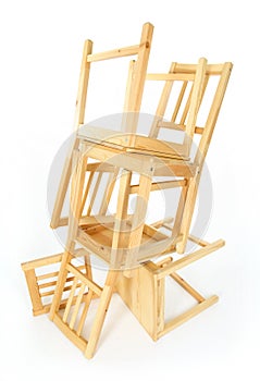 Stacked wooden chairs