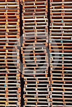 Stacked wooden pallet columns