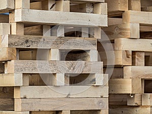 stacked wooden pallets industry image