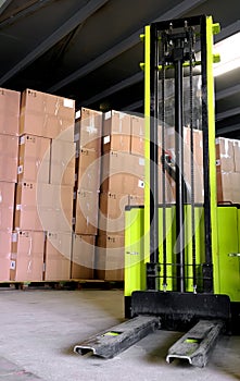 Stacker in warehouse photo