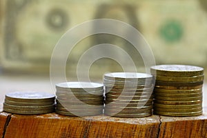 Stacking coins on the table Business growth for saving money and financial concept