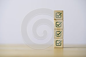 Stacking correct sign mark for document approve , project acceptance and quality assurance concept