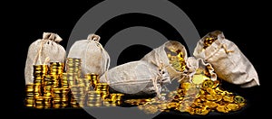 Stacking gold coin in treasure sack