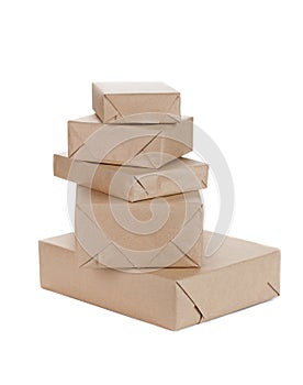 Stacking parcels boxes with kraft paper, isolated on white