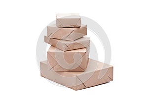 Stacking parcels boxes with kraft paper, isolated on white photo