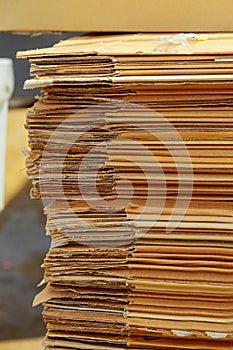 Stacking used cardboard box for recycling