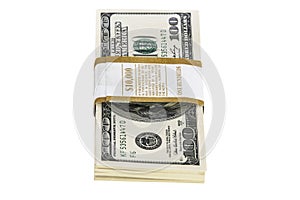 Stacks of 100 dollar bills isolated on white