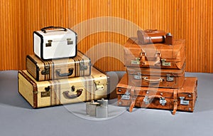 Stacks of Antique Suitcases and Drinking Flasks