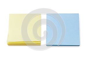 Stacks of blank yellow & blue Post-it notes