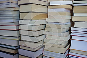 Stacks of books, close-up for background