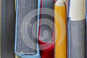 Stacks of books on the shelf.