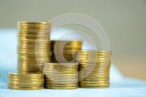 Stacks of coins and account book or credit card with copy space, finance and business finance, banking and savings concept.