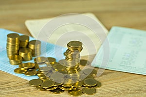 Stacks of coins and account book or credit card with copy space, finance and business finance, banking and savings concept