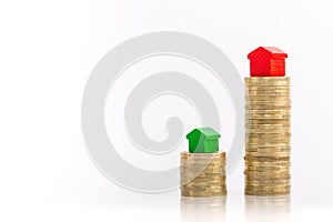 Stacks of coins with green and red home