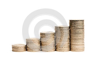 Stacks of coins on a white isolated background. 2 euro coins in a stack.