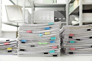 Stacks of documents with paper clips photo