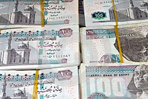 Stacks of Egypt money banknote bills EGP LE thousands of Pounds currency banknotes bill, Egyptian money exchange rate and economy