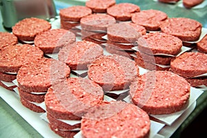 Stacks of fresh hamburger meat