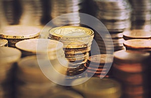 Stacks of golden euro coins