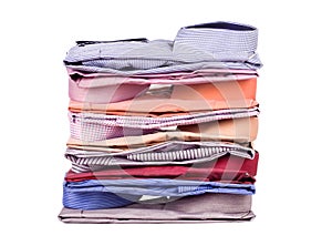 Stacks of many colored clothes