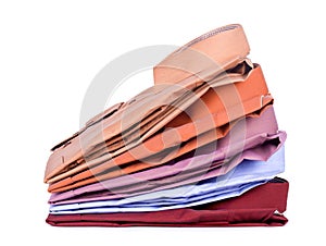 Stacks of many colored clothes