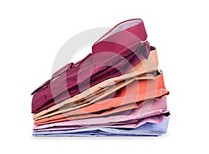 Stacks of many colored clothes