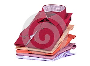 Stacks of many colored clothes