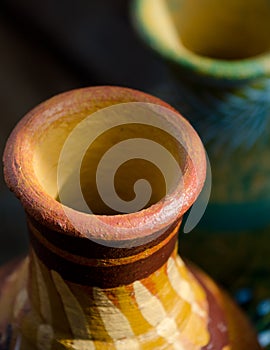 Stacks of Mexican ceramic decorative pots in workshop - 16