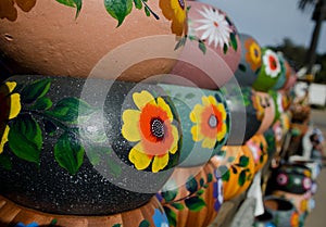 Stacks of Mexican ceramic decorative pots in workshop - 18