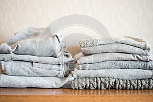 stacks monochrome gradient white gray black bed linen textiles clothing background pile concept