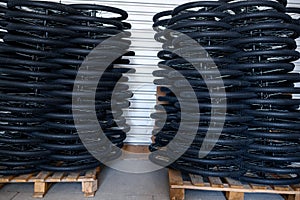 Stacks of new bicycle wheels on a pallet, nobody