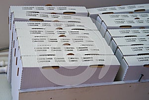 Stacks of New Pizza Boxes