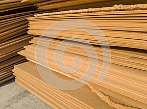 Stacks of old MDF of poor quality