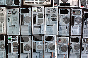 Stacks of old personal computers and pc cases