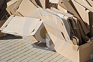 Stacks of paper and cardboard ready to be recycled - Reuse, Reduce, Recycle concept image