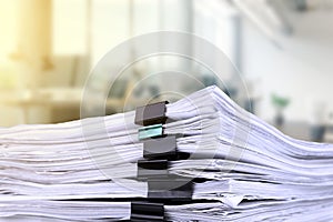 Stacks of papers on the desk in the office. business office