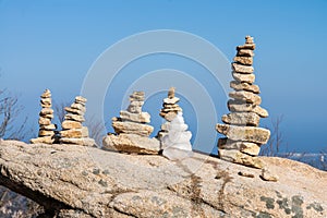 pebble stack on the rock in winter