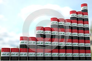 Stacks of steel drums with flag of Iraq form increasing chart or upwards trend. Petroleum industry success concept, 3D