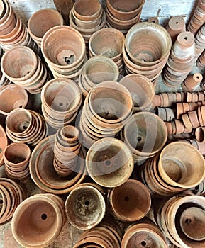 Stacks of terracotta plant pots