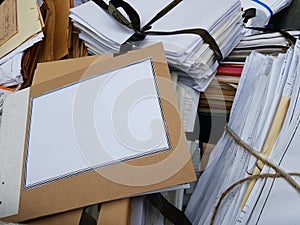 Stacks of tied waste paper for disposal.