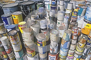 Stacks of toxic paint cans