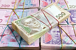 Stacks of Ukrainian hryvnia banknotes. The money of Ukraine