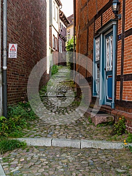 Stade, Germany - August 25, 2019: View at cobbled alley in historical part of Stade, Germany