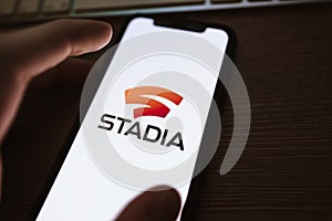 Stadia logo on the smartphone screen.