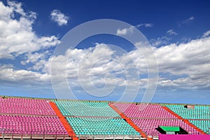 Stadium colorful grandstand blue sky